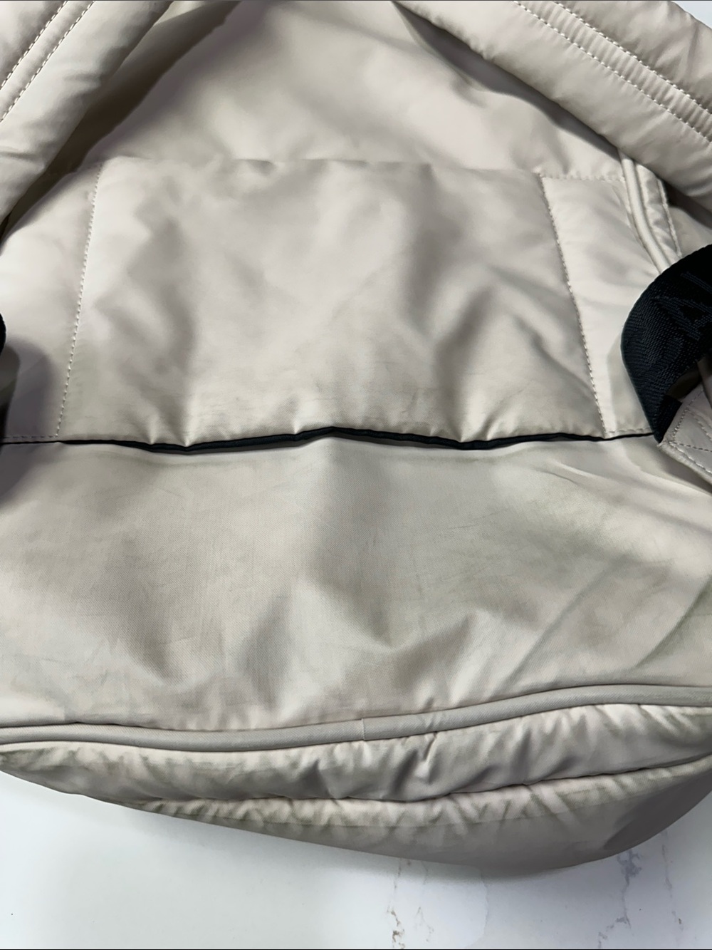 Calpak Light Beige Padded Backpack with Black Accents. Travel Backpack - Picture 5 of 11